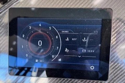 Slide: The Image of Dashboard display of 2025 Highfield Jet 420 showing speed and gauges. - 13