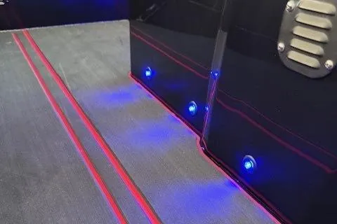 Slide: The Image of Highfield Jet 420 (2025) interior with blue LED lights and red accents. - 17