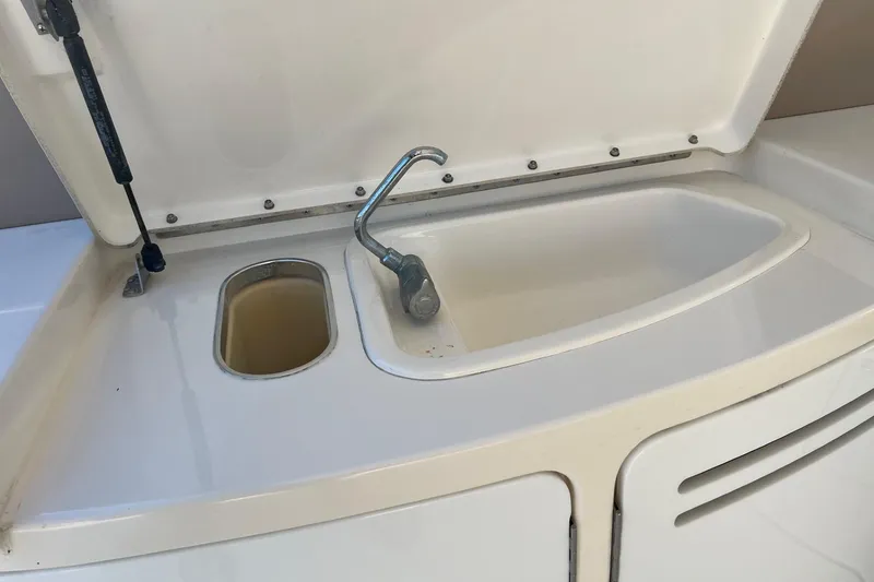 Slide: The Image of 1998 Sea Ray 540 Sundancer yacht sink and faucet detail. - 11