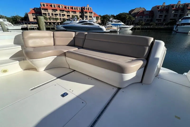 Slide: The Image of Luxury seating on 1998 Sea Ray 540 Sundancer yacht, docked in a marina. - 15
