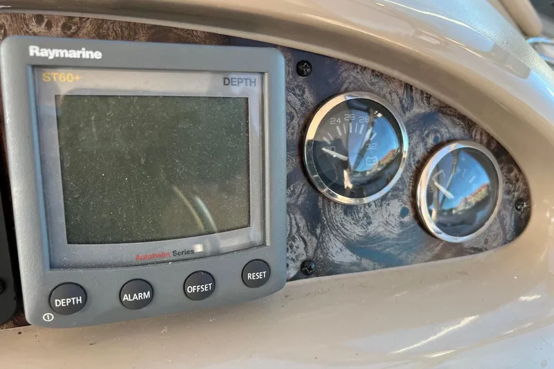 Slide: The Image of Control panel of a 1998 Sea Ray 540 Sundancer with Raymarine ST60+ depth display. - 25