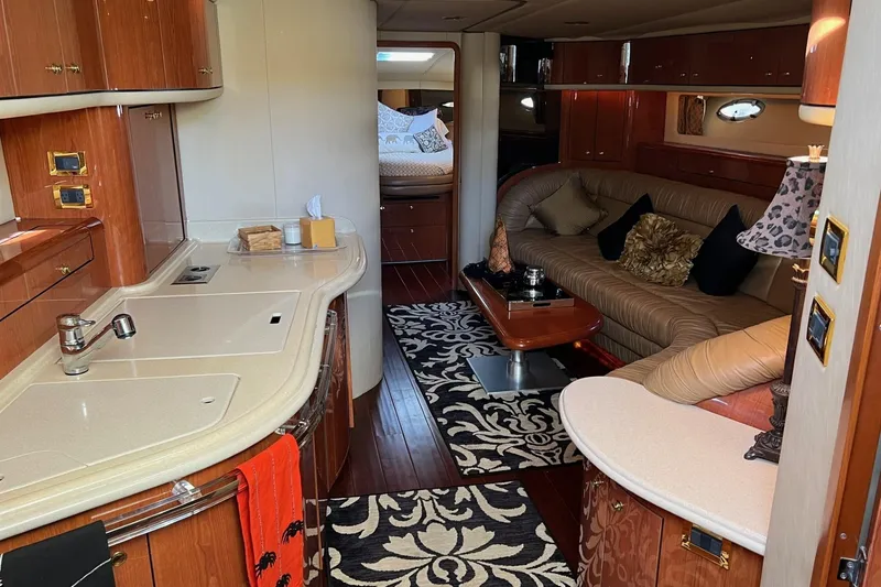 Slide: The Image of Luxurious interior of 1998 Sea Ray 540 Sundancer yacht with elegant furnishings and modern amenities. - 32