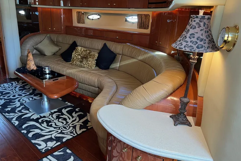 Slide: The Image of Luxurious interior of 1998 Sea Ray 540 Sundancer yacht with elegant seating and decor. - 34