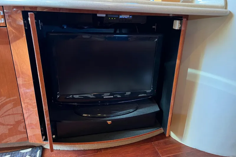 Slide: The Image of Samsung TV in wooden cabinet on 1998 Sea Ray 540 Sundancer yacht. - 41