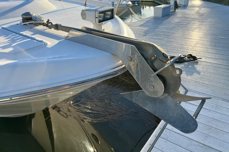 Slide: The Image of 1998 Sea Ray 540 Sundancer boat anchor on docked vessel in marina. - 5
