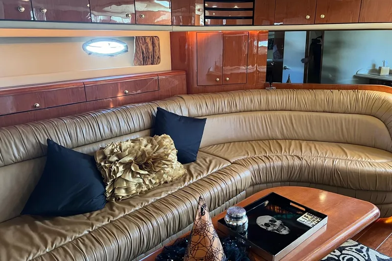Slide: The Image of Luxurious interior of 1998 Sea Ray 540 Sundancer yacht with leather seating and elegant decor. - 56