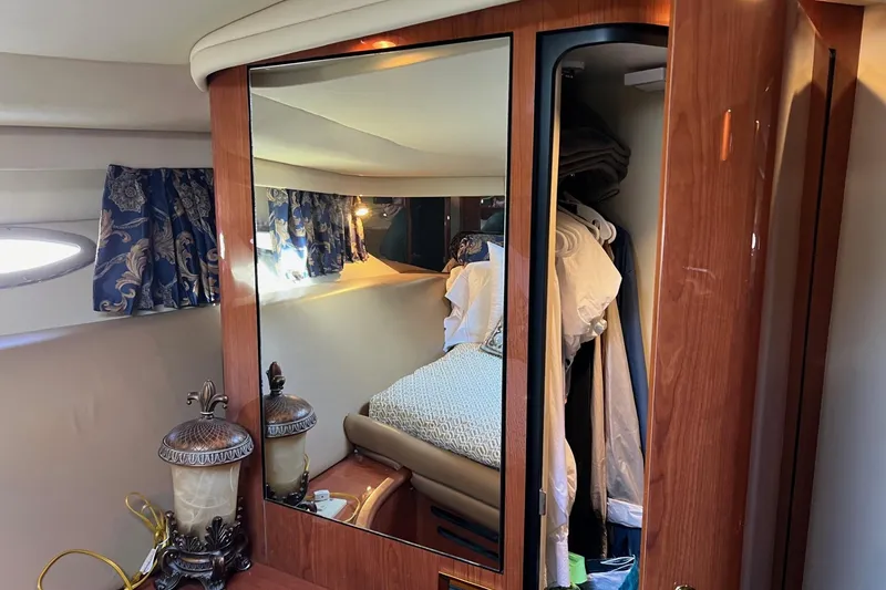 Slide: The Image of Interior of 1998 Sea Ray 540 Sundancer with mirrored closet and elegant decor. - 65