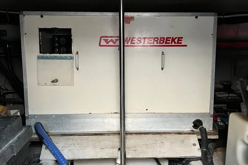 Slide: The Image of Westerbeke generator in 1998 Sea Ray 540 Sundancer engine room. - 82