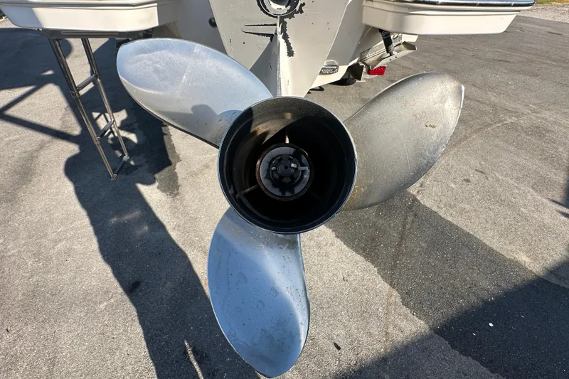 Slide: The Image of Close-up of a 2019 Regal 26 OBX boat propeller on a sunny day. - 13