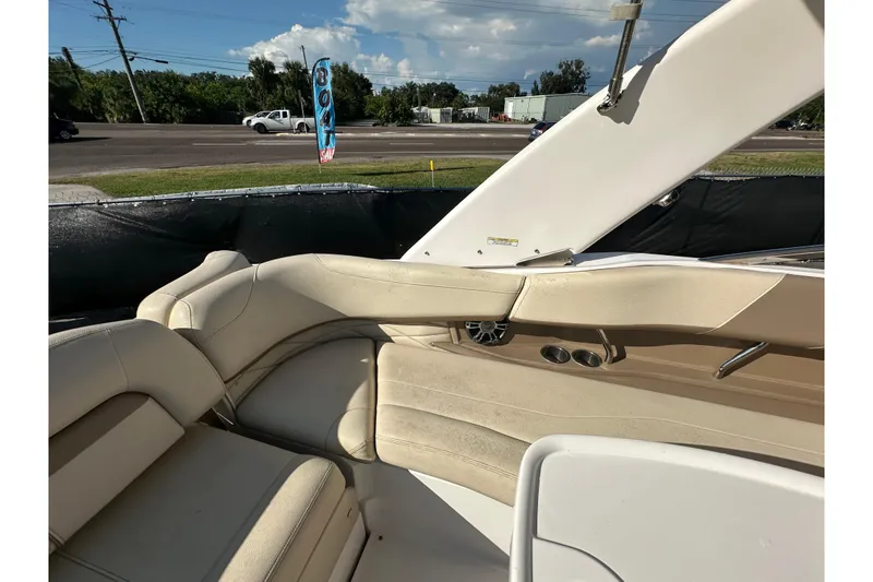 Slide: The Image of 2019 Regal 26 OBX boat interior with beige seating and sleek design. - 49