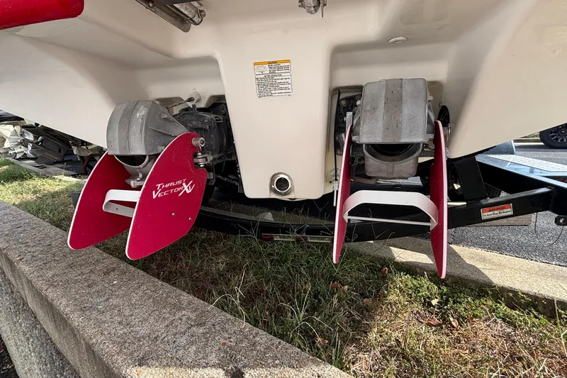 Slide: The Image of 2008 Yamaha Boats SX230 interior with white seating and gray flooring. - 20