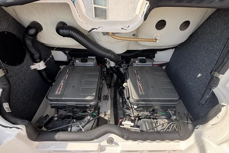 Slide: The Image of 2008 Yamaha Boats SX230 interior with seating and storage compartments. - 23