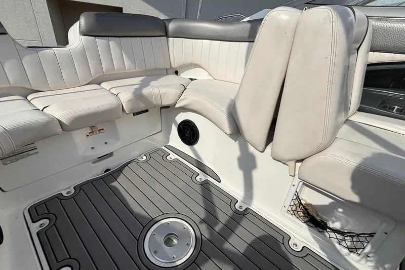 Slide: The Image of 2008 Yamaha Boats SX230 interior with white seating and dashboard view. - 33