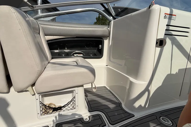 Slide: The Image of 2008 Yamaha Boats SX230 interior with seating and dashboard, showcasing luxury and comfort. - 35