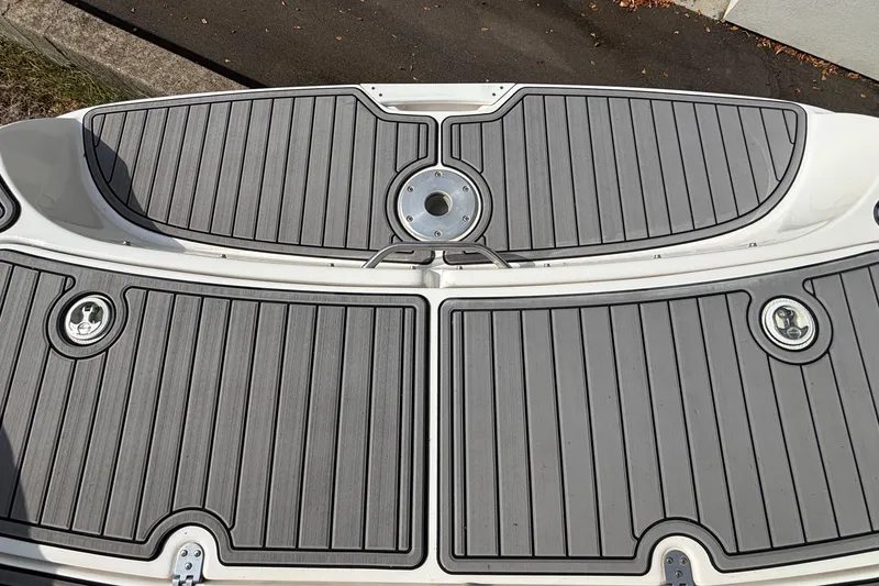 Slide: The Image of 2008 Yamaha Boats SX230 with red canopy under a clear blue sky. - 5