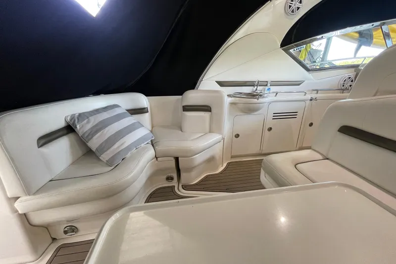 Slide: The Image of Luxurious interior of 2007 Sea Ray 38 Sundancer yacht with plush seating and kitchenette. - 15
