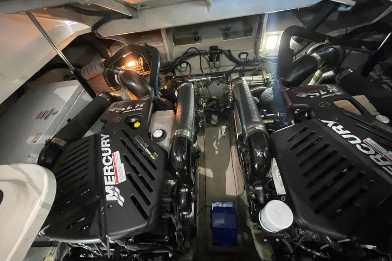 Slide: The Image of Engine room of 2007 Sea Ray 38 Sundancer with twin Mercury engines. - 33