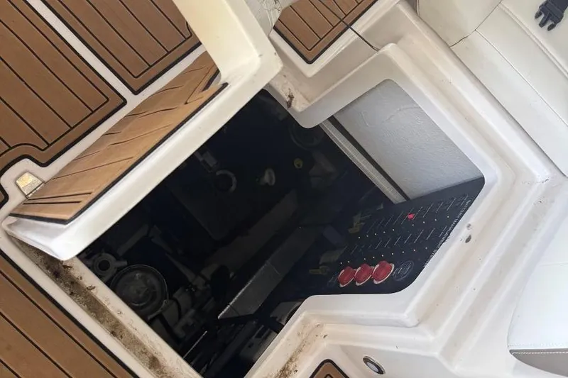 Slide: The Image of Open engine compartment of 2016 Regal 46 Sport Coupe with visible control panel. - 15