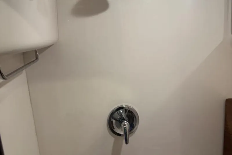 Slide: The Image of Shower control in 2016 Regal 46 Sport Coupe yacht bathroom. - 44