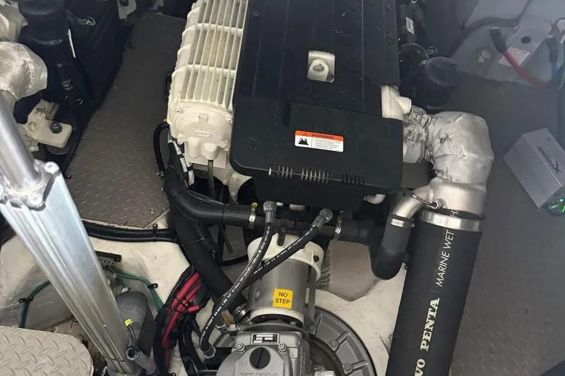 Slide: The Image of Engine compartment of a 2016 Regal 46 Sport Coupe with Volvo Penta components. - 48