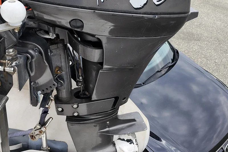 Slide: The Image of Close-up of a boat engine part on a 2007 Meridian 341 Sedan. - 10