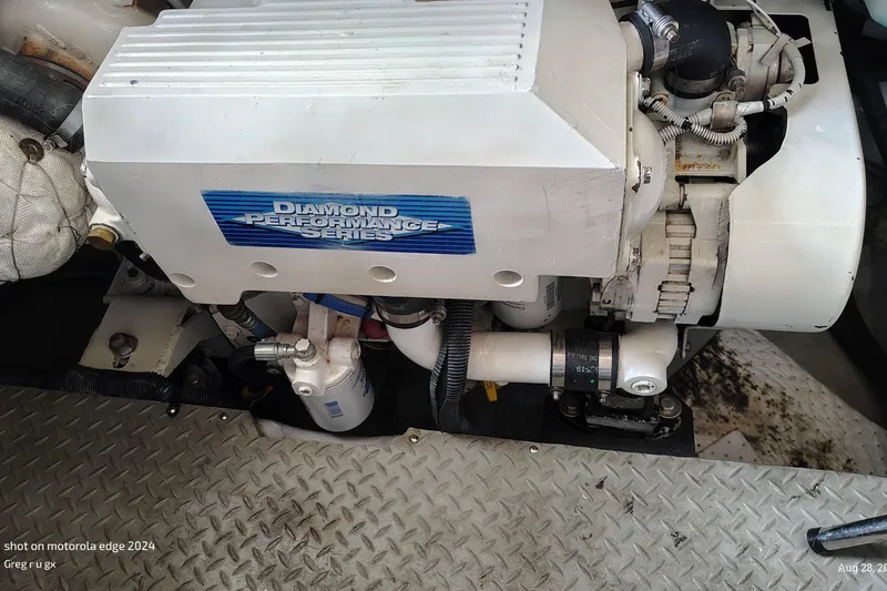 Slide: The Image of Engine compartment of a 2007 Meridian 341 Sedan with Diamond Performance Series engine. - 11