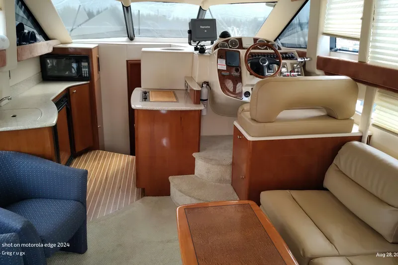 Slide: The Image of Interior of a 2007 Meridian 341 Sedan yacht with luxurious seating and modern amenities. - 4