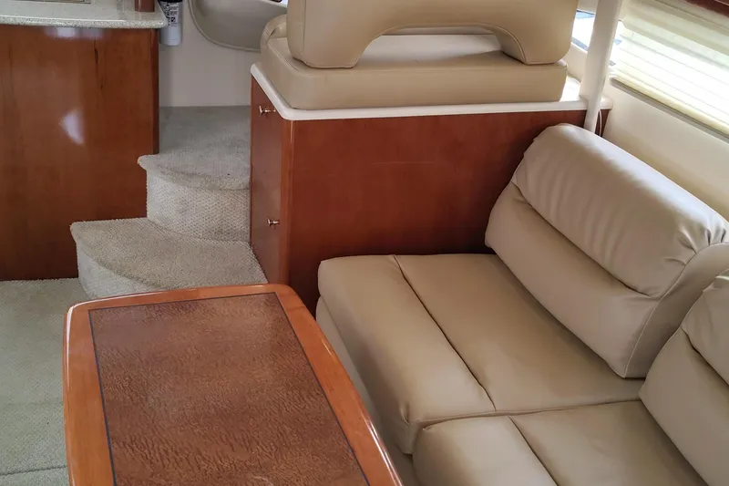 Slide: The Image of Interior of 2007 Meridian 341 Sedan with beige leather seating and wooden accents. - 5
