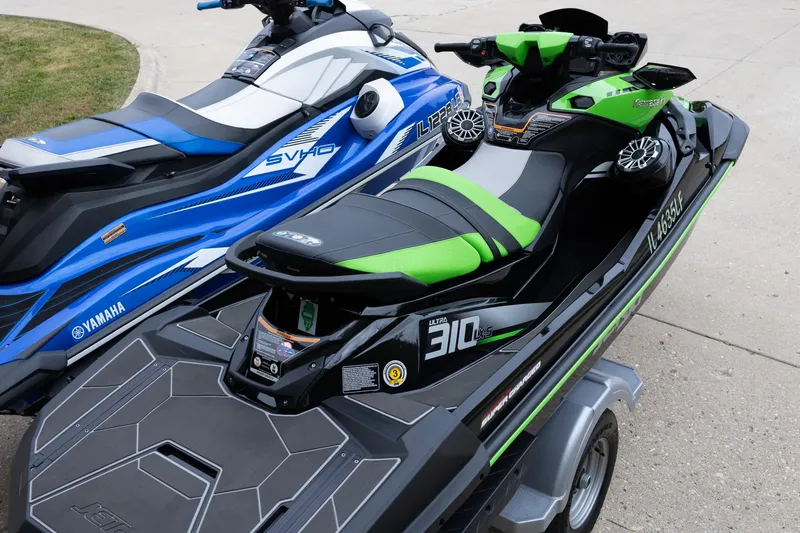 Slide: The Image of 2021 Yamaha WaveRunner GP1800R SVHO and Kawasaki Jet Ski on trailer. - 18