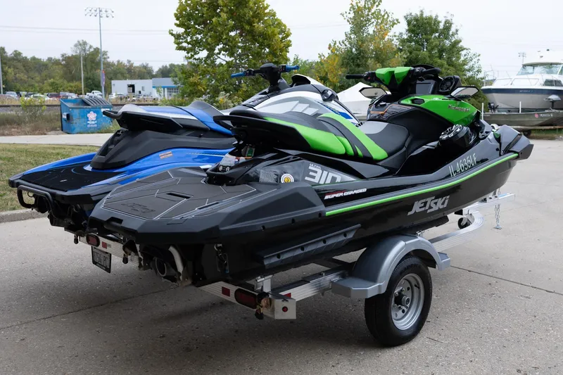 Slide: The Image of 2021 Yamaha WaveRunner GP1800R SVHO and Kawasaki Jet Ski on trailer. - 5
