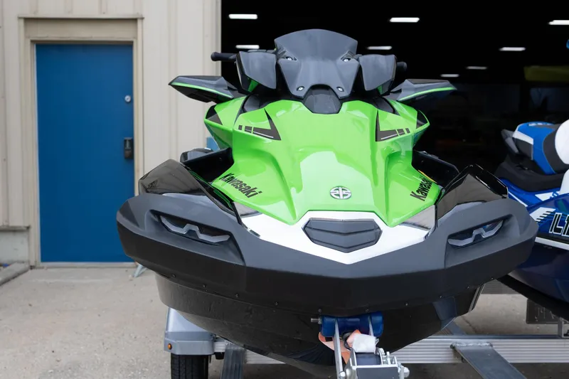 Slide: The Image of Green and black 2021 Yamaha WaveRunner GP1800R SVHO jet ski on a trailer. - 8