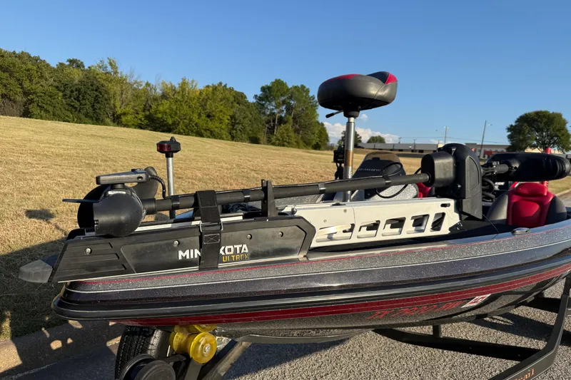 Slide: The Image of 2013 Ranger Z117 boat on trailer by a lake, ready for launch. - 17
