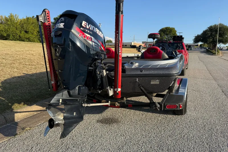Slide: The Image of 2013 Ranger Z117 boat with Minn Kota Ultrex trolling motor on grassy area. - 26