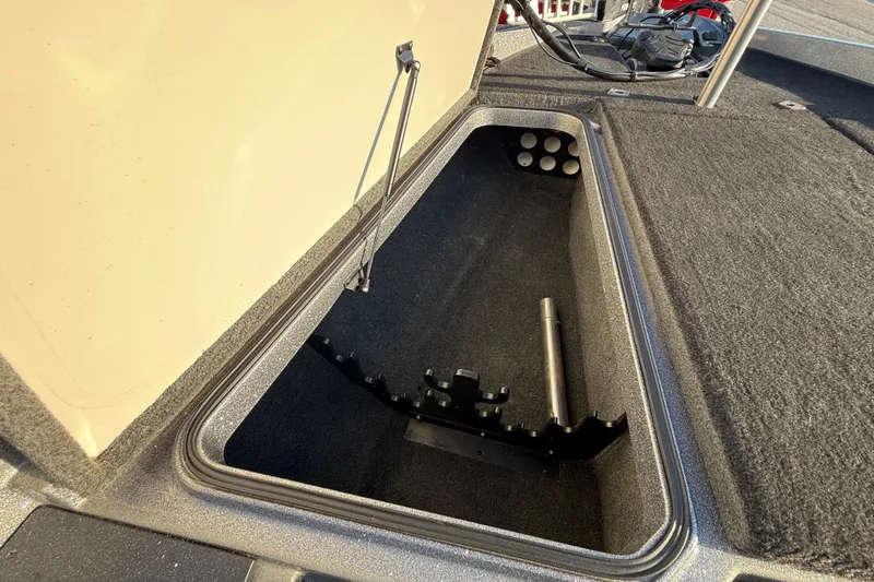 Slide: The Image of Close-up of a 2013 Ranger Z117 tire on a sunny road. - 36