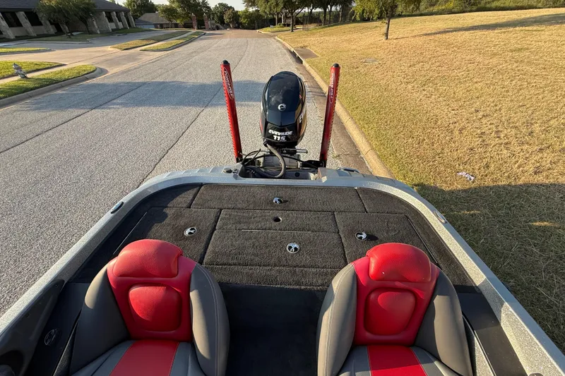 Slide: The Image of 2013 Ranger Z117 boat storage compartment with open lid and hydraulic support. - 42