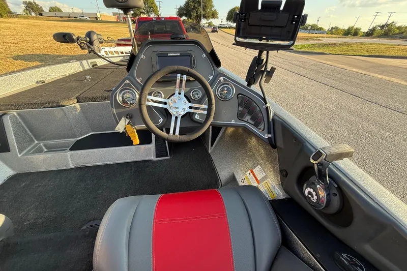 Slide: The Image of Ranger Z117 2013 boat storage compartment with drain, featuring a sleek, durable design. - 43