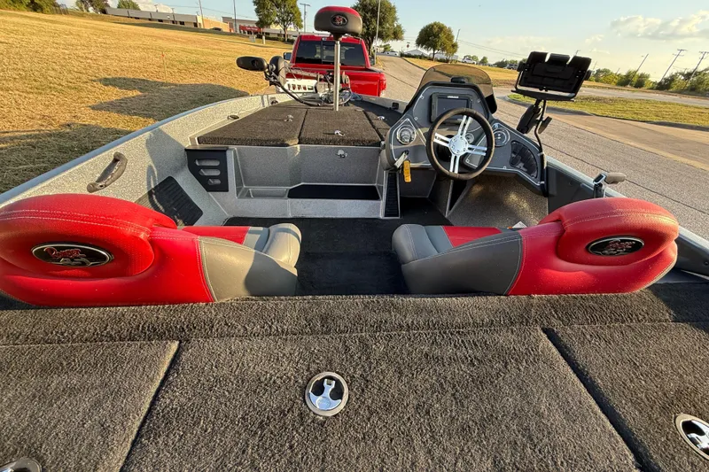 Slide: The Image of 2013 Ranger Z117 boat battery compartment with wiring and chargers. - 50
