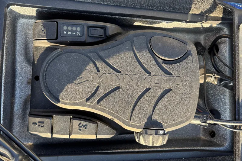 Slide: The Image of Battery compartment of 2013 Ranger Z117 boat with wiring and NOCO Genius charger. - 51