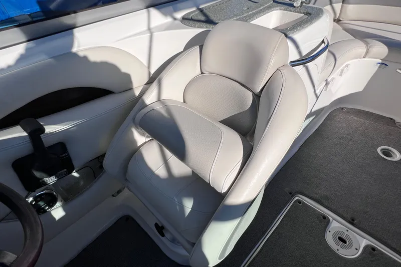 Slide: The Image of 2006 Chaparral 256 SSi boat interior with plush seating and sleek design. - 18
