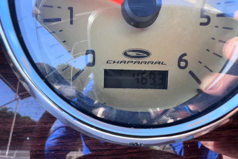 Slide: The Image of Close-up of 2006 Chaparral 256 SSi boat gauge displaying 469.3 hours. - 21