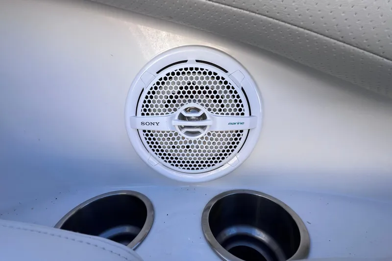 Slide: The Image of Sony marine speaker and cup holders in 2006 Chaparral 256 SSi boat interior. - 35