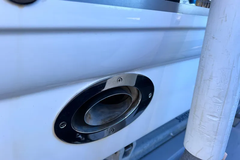 Slide: The Image of Close-up of 2006 Chaparral 256 SSi boat exhaust port with chrome detailing. - 7