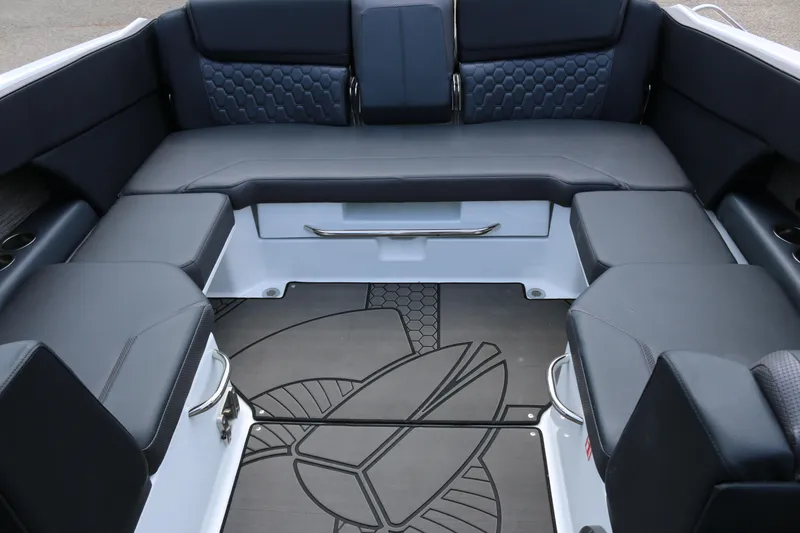 Slide: The Image of Interior of 2026 Scarab 255 LX boat with sleek seating and modern design. - 16