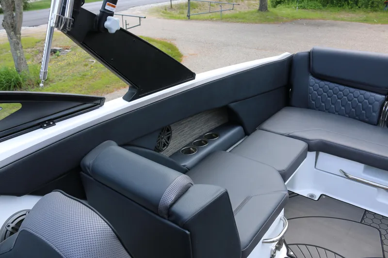 Slide: The Image of Interior of 2026 Scarab 255 LX boat with sleek seating and modern design. - 17