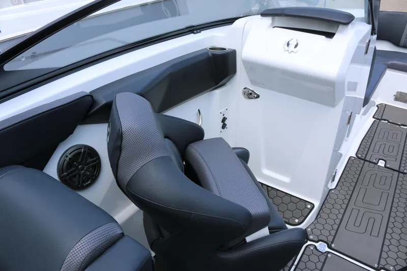 Slide: The Image of Interior of 2026 Scarab 255 LX boat with sleek seating and modern design. - 19
