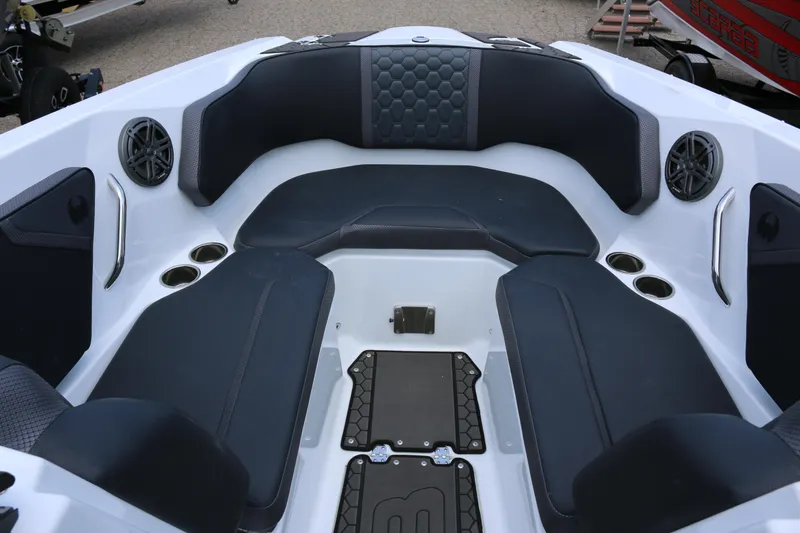 Slide: The Image of Interior of 2026 Scarab 255 LX boat with sleek seating and modern design. - 22
