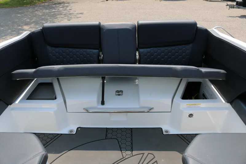 Slide: The Image of 2026 Scarab 255 LX boat interior with sleek seating and modern design. - 29