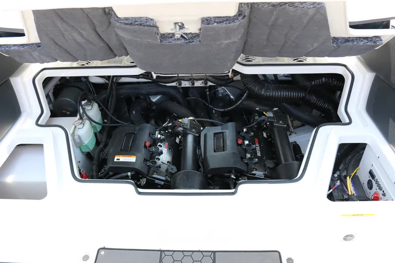 Slide: The Image of Engine compartment of 2026 Scarab 255 LX boat, showcasing dual engines and components. - 30