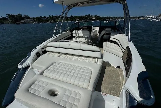 Slide: The Image of 2019 Cobalt R7 boat with luxurious seating on a calm lake. - 1