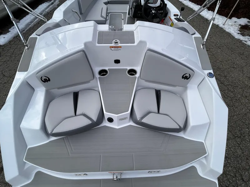 Slide: The Image of Dashboard of 2025 Scarab 165 SE boat with speedometer and tachometer. - 13